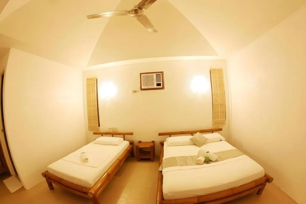 Bed in Elysia Beach Resort