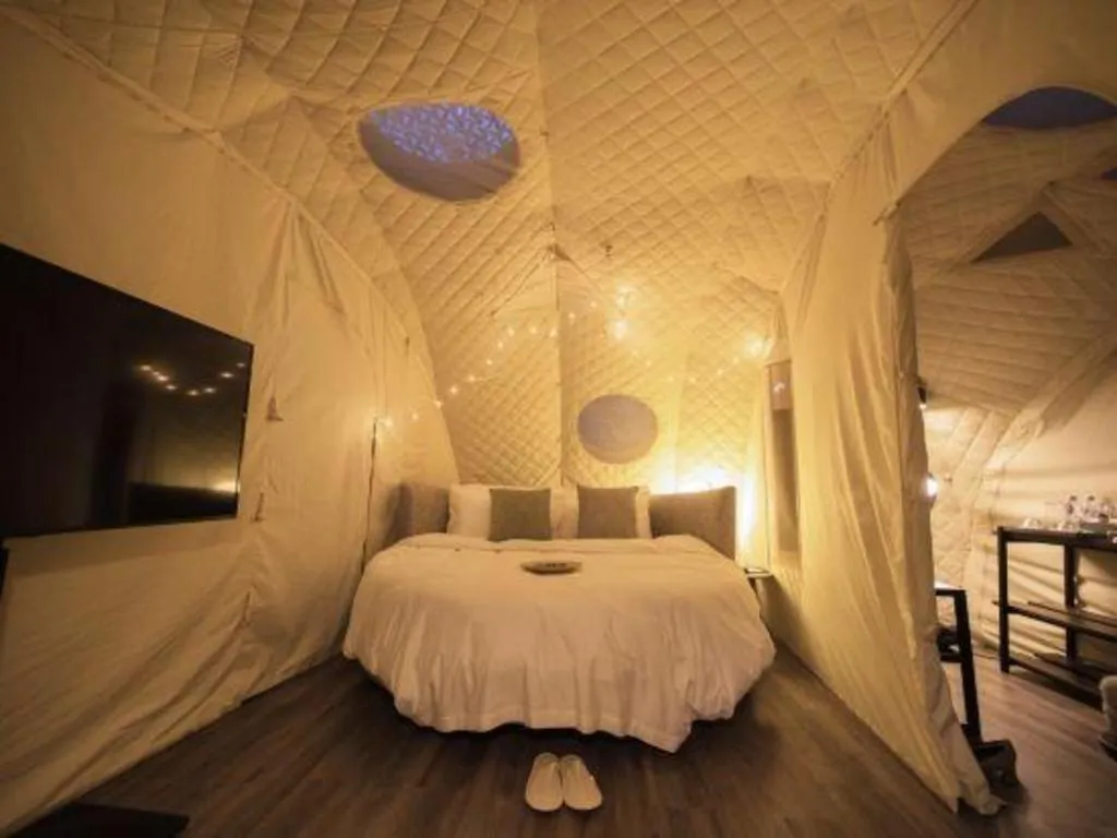 Bed in The Mulian Urban Resort Hotels Huadu