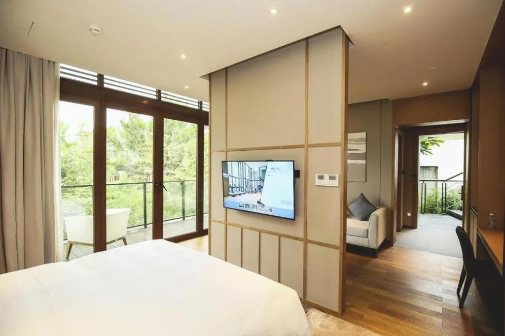 Bed in The Mulian Urban Resort Hotels Huadu