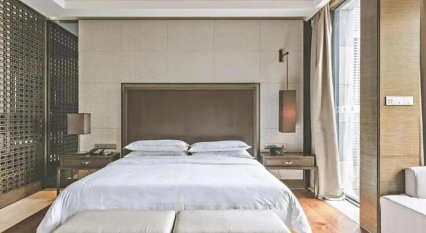 Bed in The Mulian Urban Resort Hotels Huadu