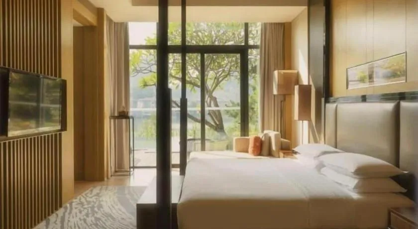 Bed in The Mulian Urban Resort Hotels Huadu