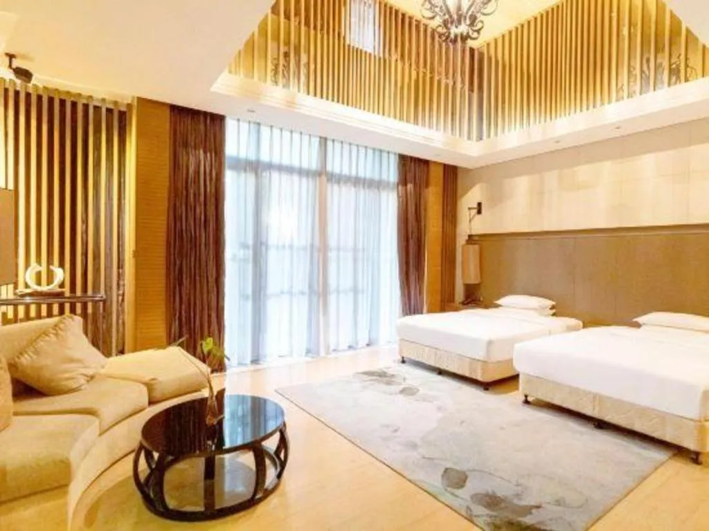 Bed in The Mulian Urban Resort Hotels Huadu