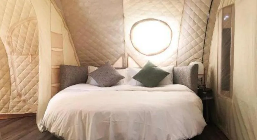 Bed in The Mulian Urban Resort Hotels Huadu