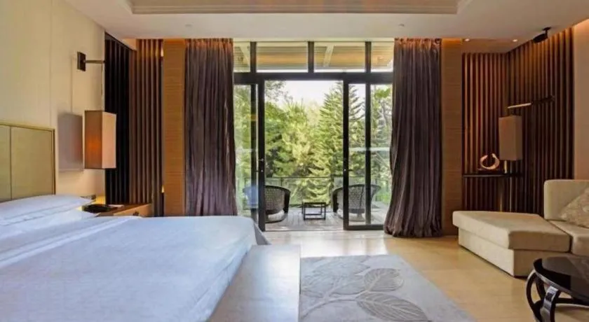 Bed in The Mulian Urban Resort Hotels Huadu