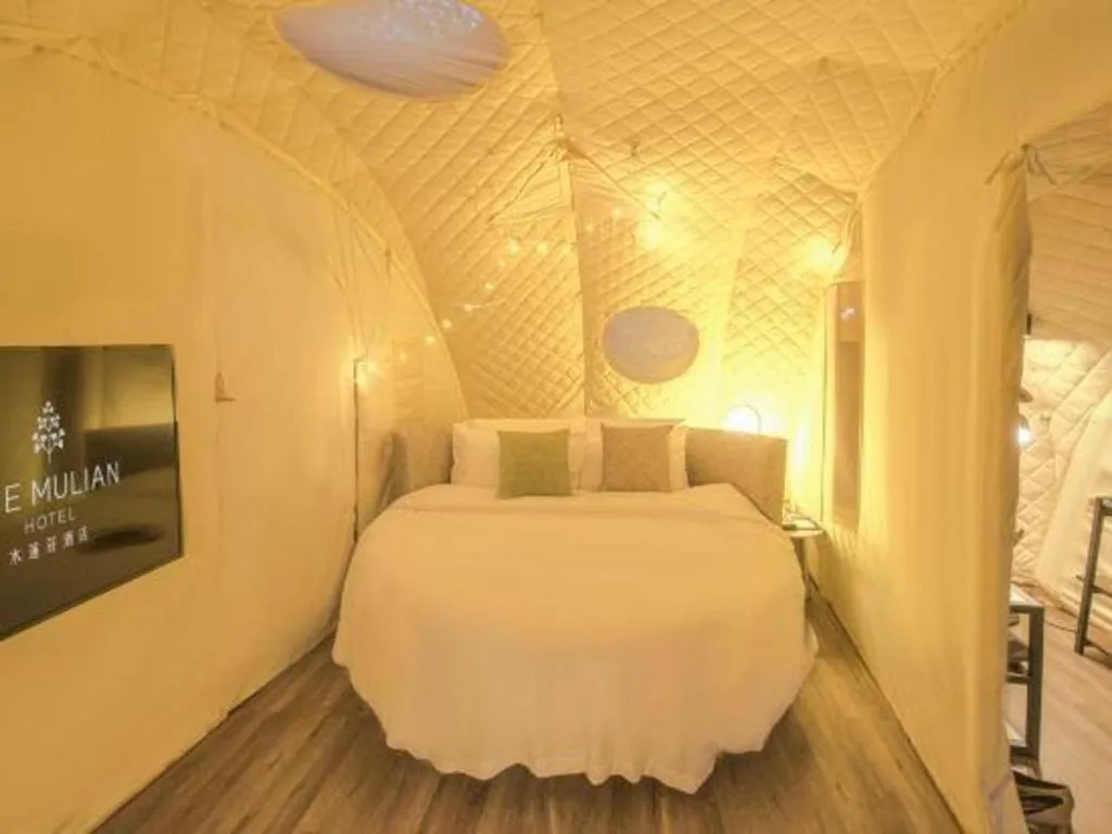 Bed in The Mulian Urban Resort Hotels Huadu