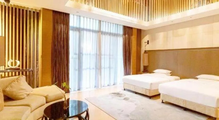 Bed in The Mulian Urban Resort Hotels Huadu