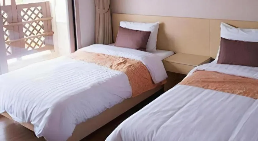 Bed in Richell Hotel