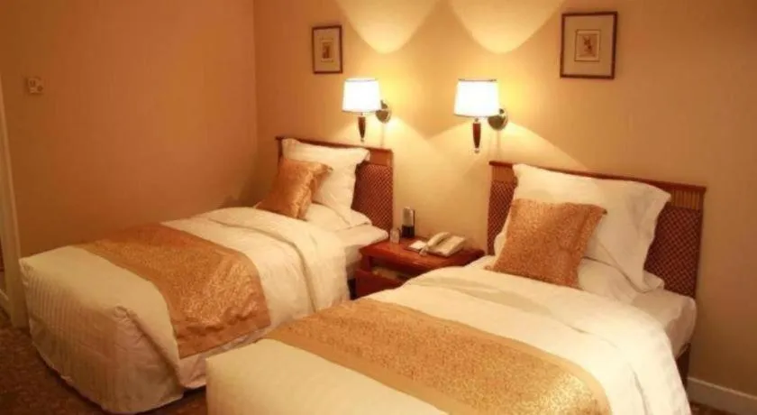 Bed in Jianguo Garden Hotel