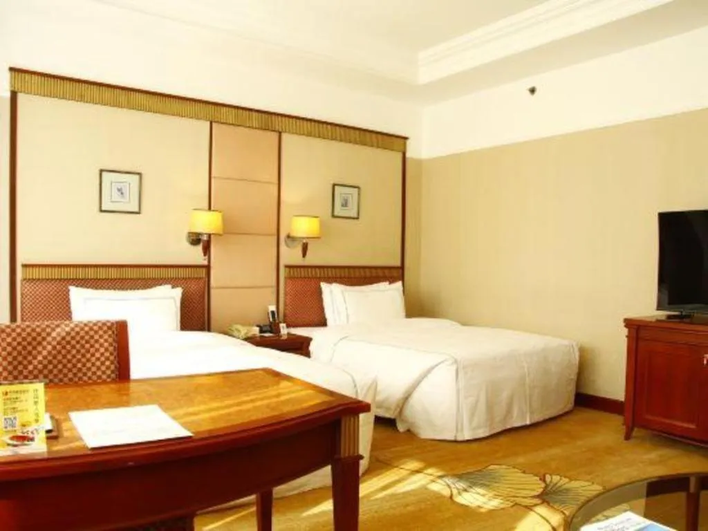 Bed in Jianguo Garden Hotel