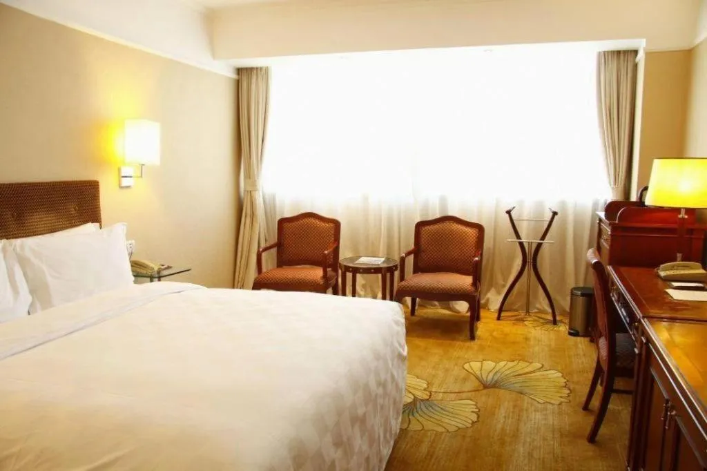 Bed in Jianguo Garden Hotel