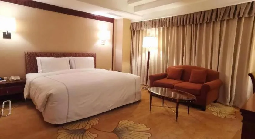 Bed in Jianguo Garden Hotel