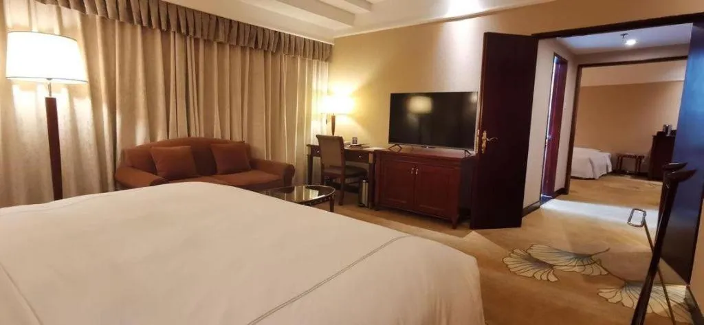 Bed in Jianguo Garden Hotel