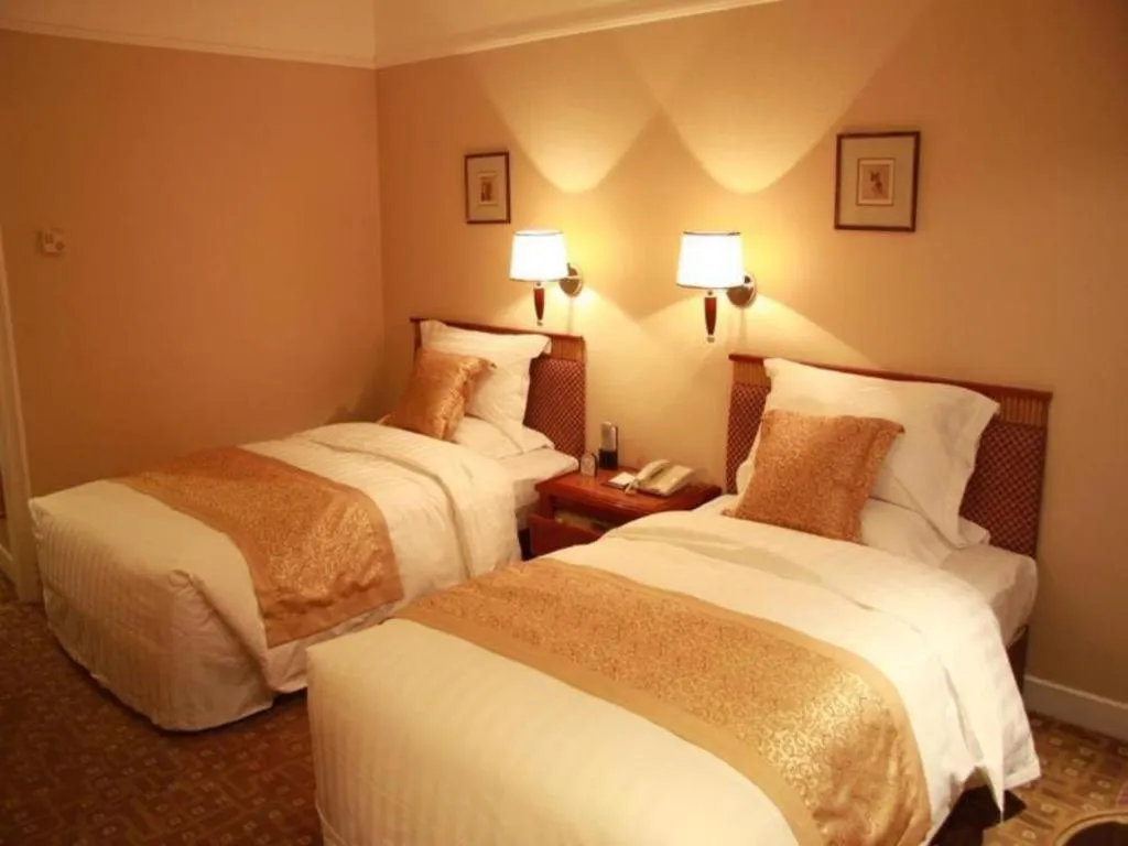 Bed in Jianguo Garden Hotel