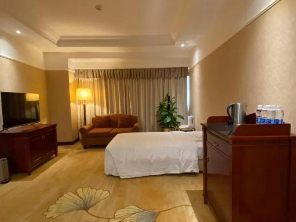 Bed in Jianguo Garden Hotel