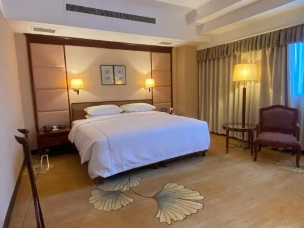 Bed in Jianguo Garden Hotel