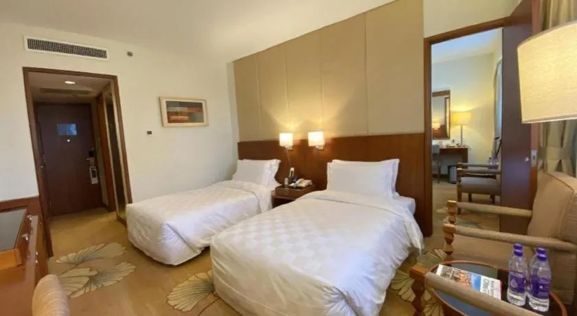 Bed in Jianguo Garden Hotel