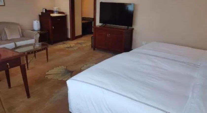 Bed in Jianguo Garden Hotel