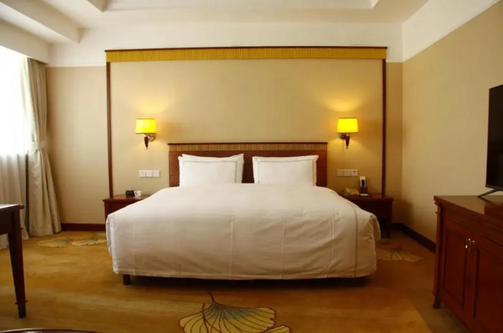 Bed in Jianguo Garden Hotel
