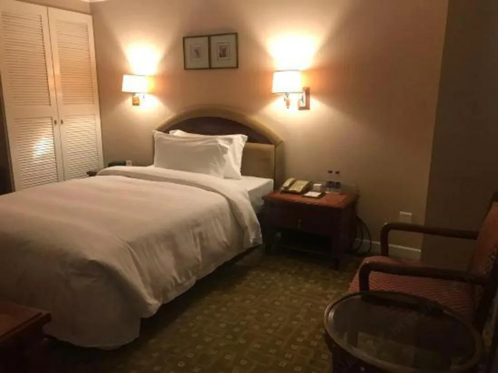 Bed in Jianguo Garden Hotel