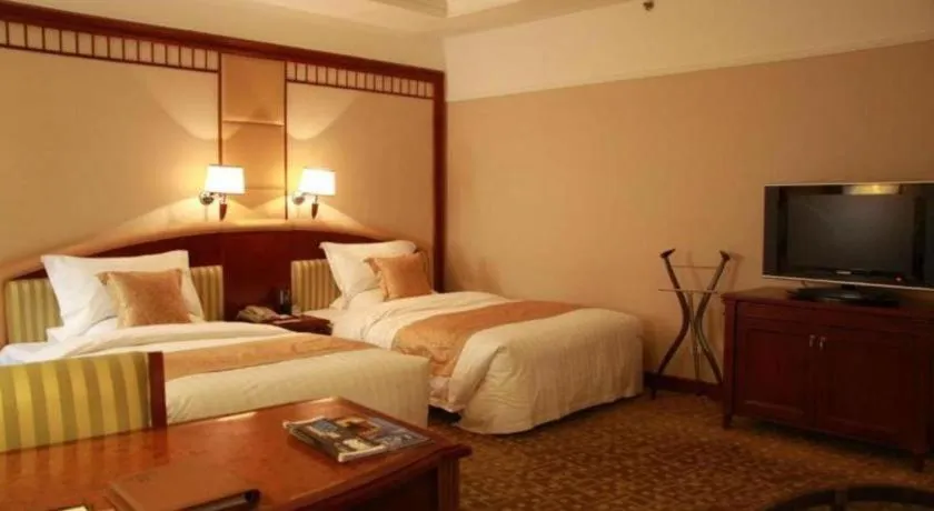 Bed in Jianguo Garden Hotel