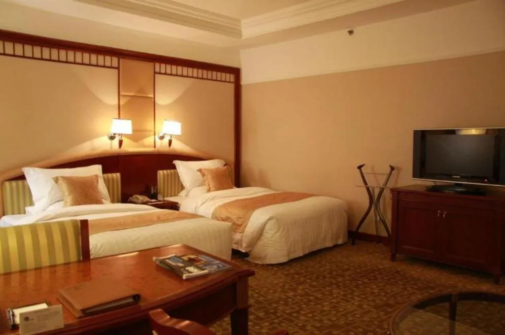 Bed in Jianguo Garden Hotel