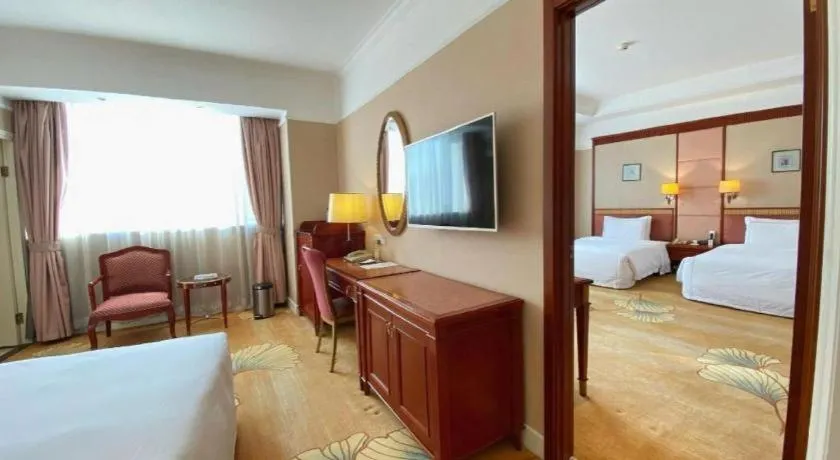 Bed in Jianguo Garden Hotel