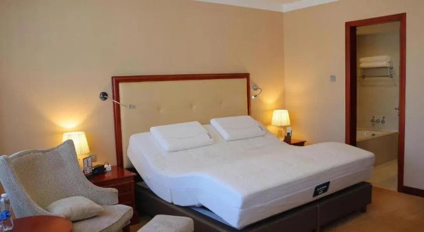 Bed in Jianguo Garden Hotel