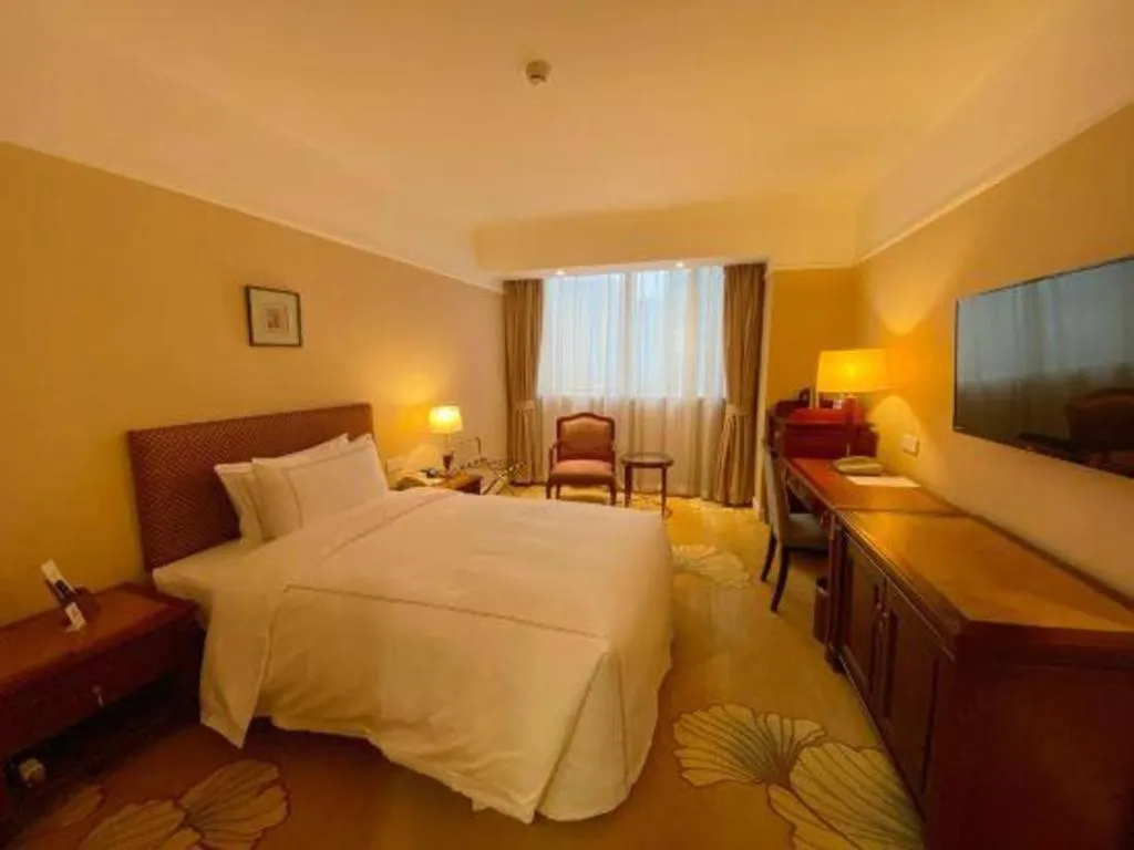 Bed in Jianguo Garden Hotel