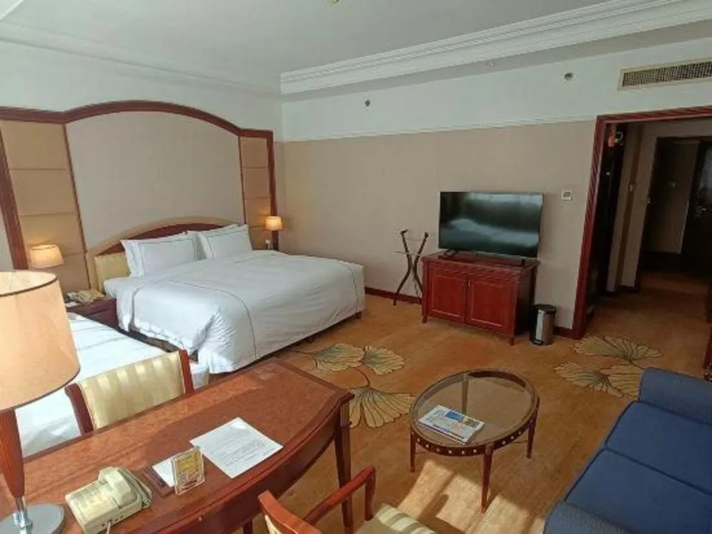 Bed in Jianguo Garden Hotel