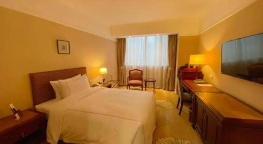 Bed in Jianguo Garden Hotel