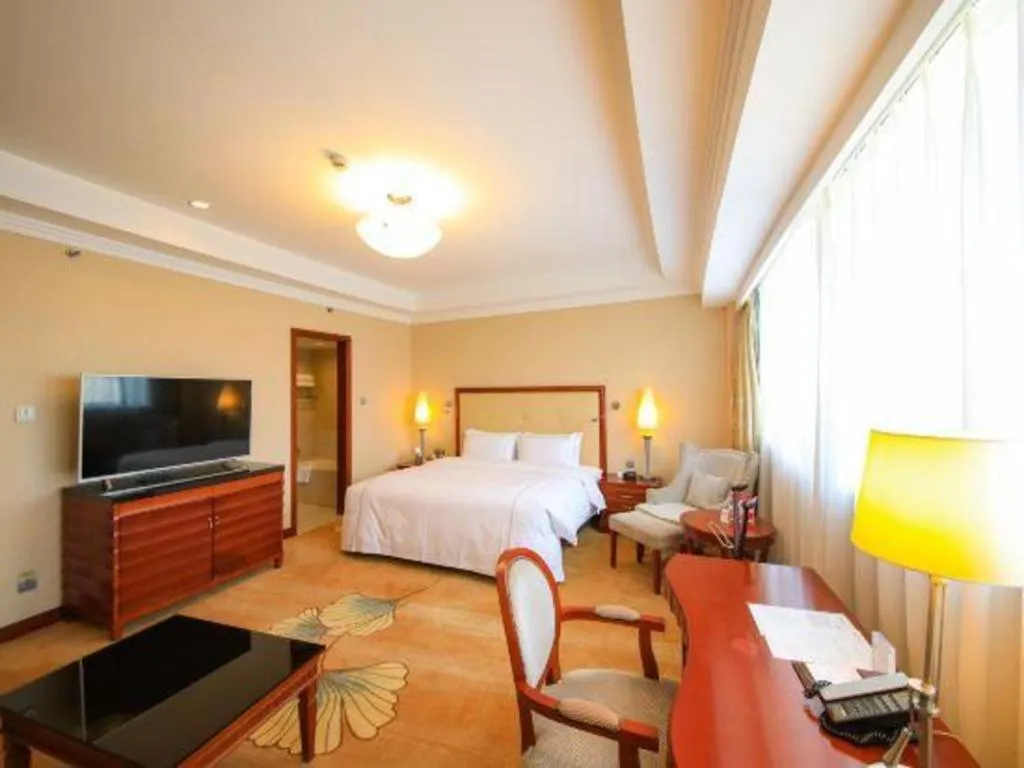 Bed in Jianguo Garden Hotel