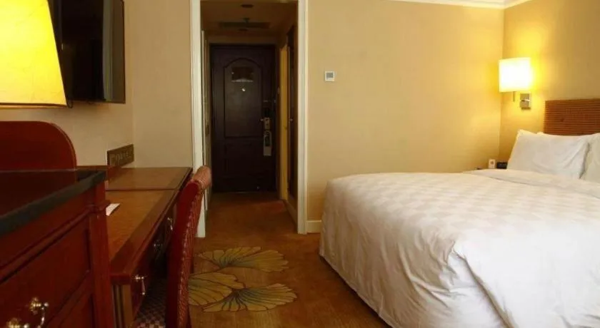 Bed in Jianguo Garden Hotel