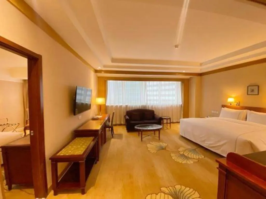 Bed in Jianguo Garden Hotel