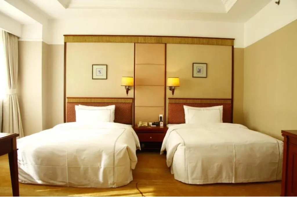 Bed in Jianguo Garden Hotel