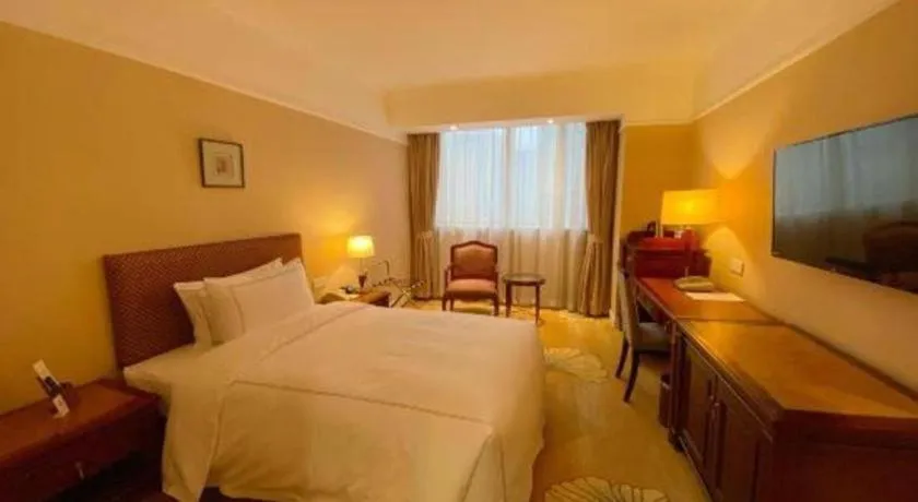 Bed in Jianguo Garden Hotel