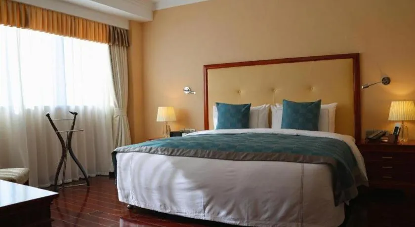 Bed in Jianguo Garden Hotel