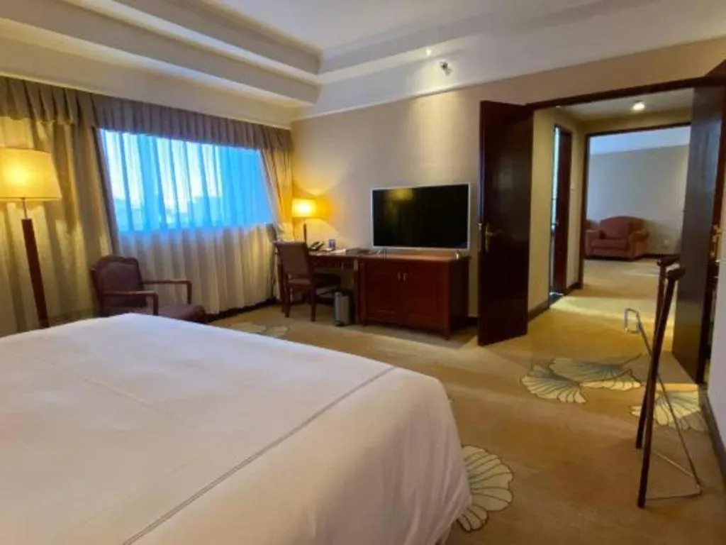 Bed in Jianguo Garden Hotel