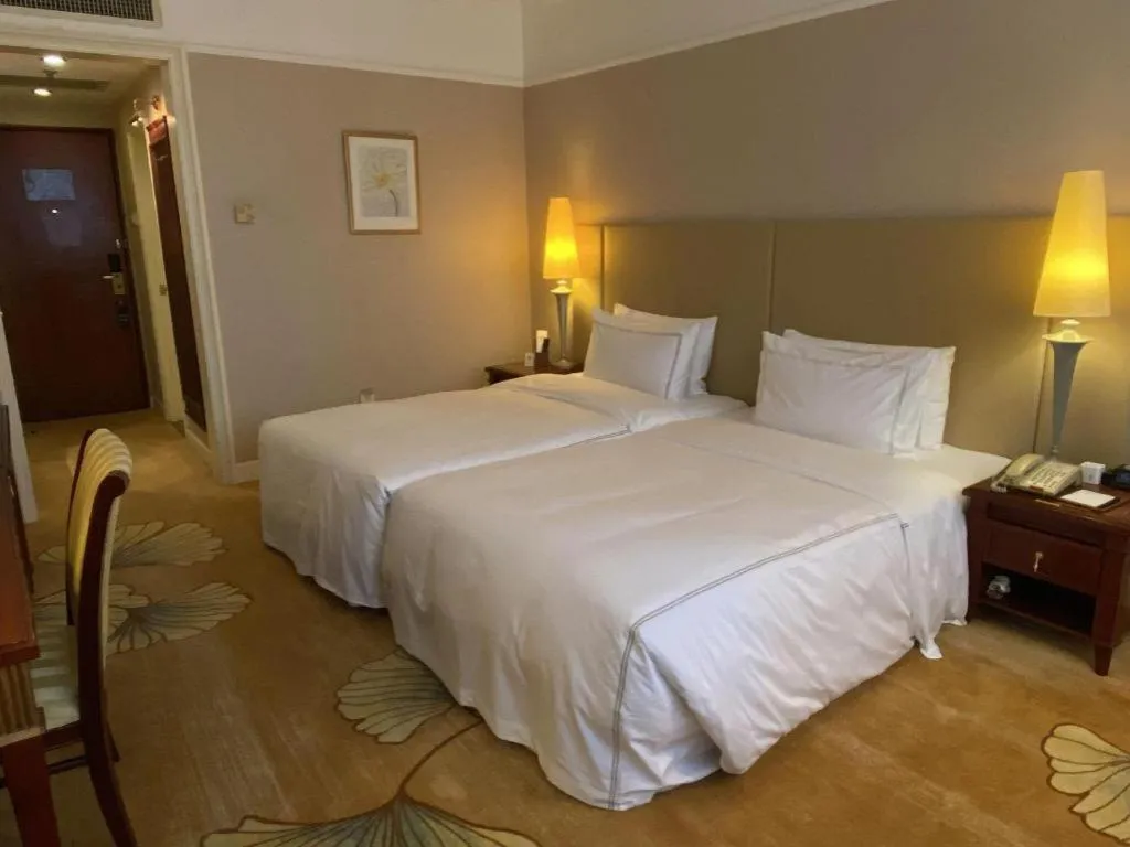 Bed in Jianguo Garden Hotel