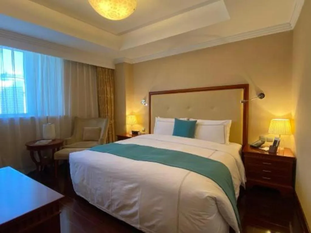 Bed in Jianguo Garden Hotel