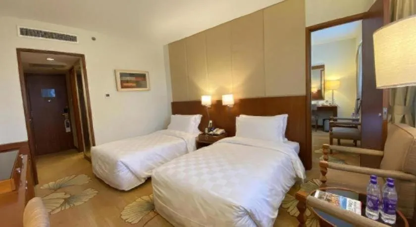 Bed in Jianguo Garden Hotel