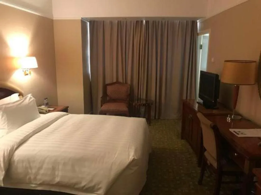 Bed in Jianguo Garden Hotel