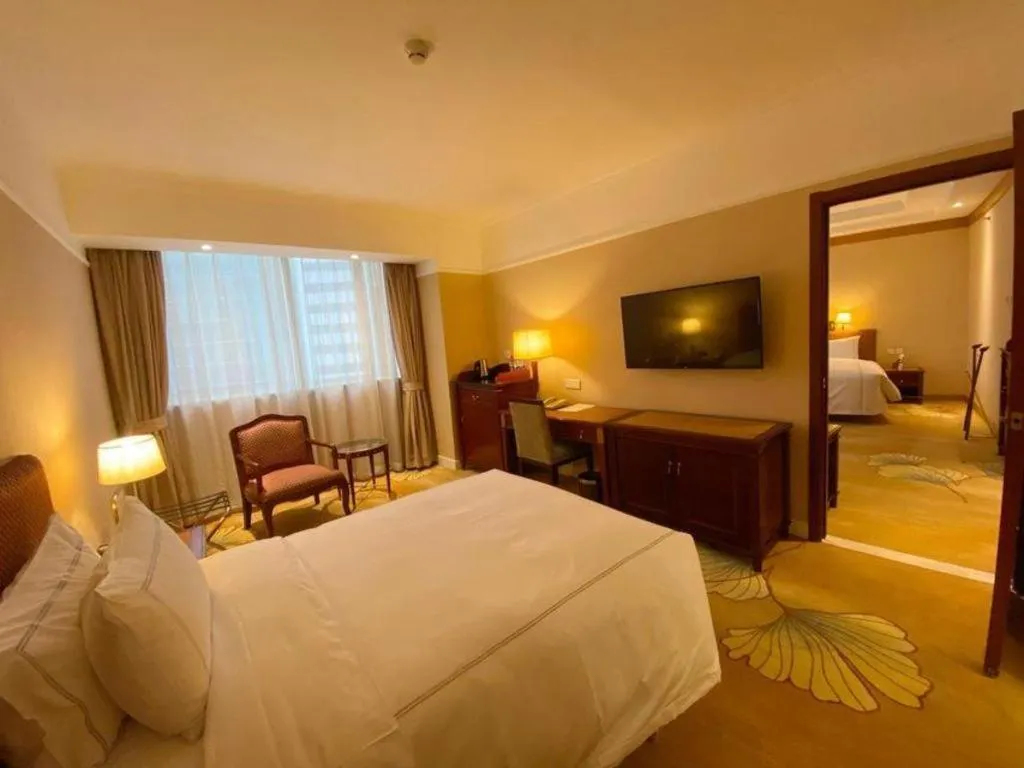 Bed in Jianguo Garden Hotel