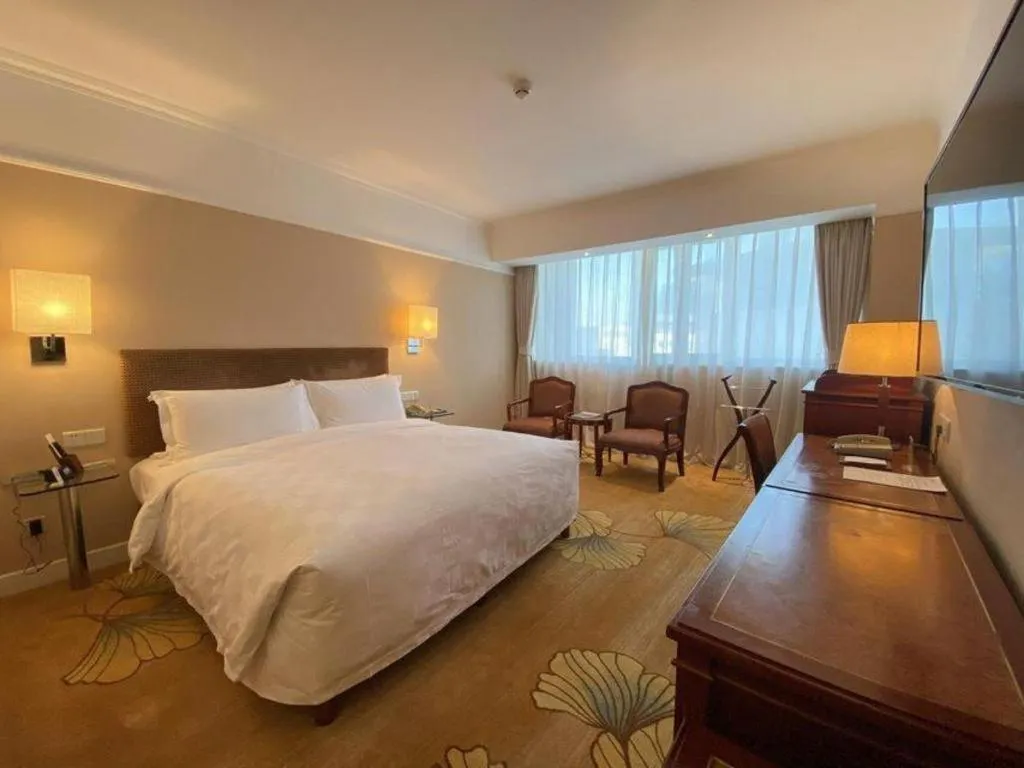 Bed in Jianguo Garden Hotel