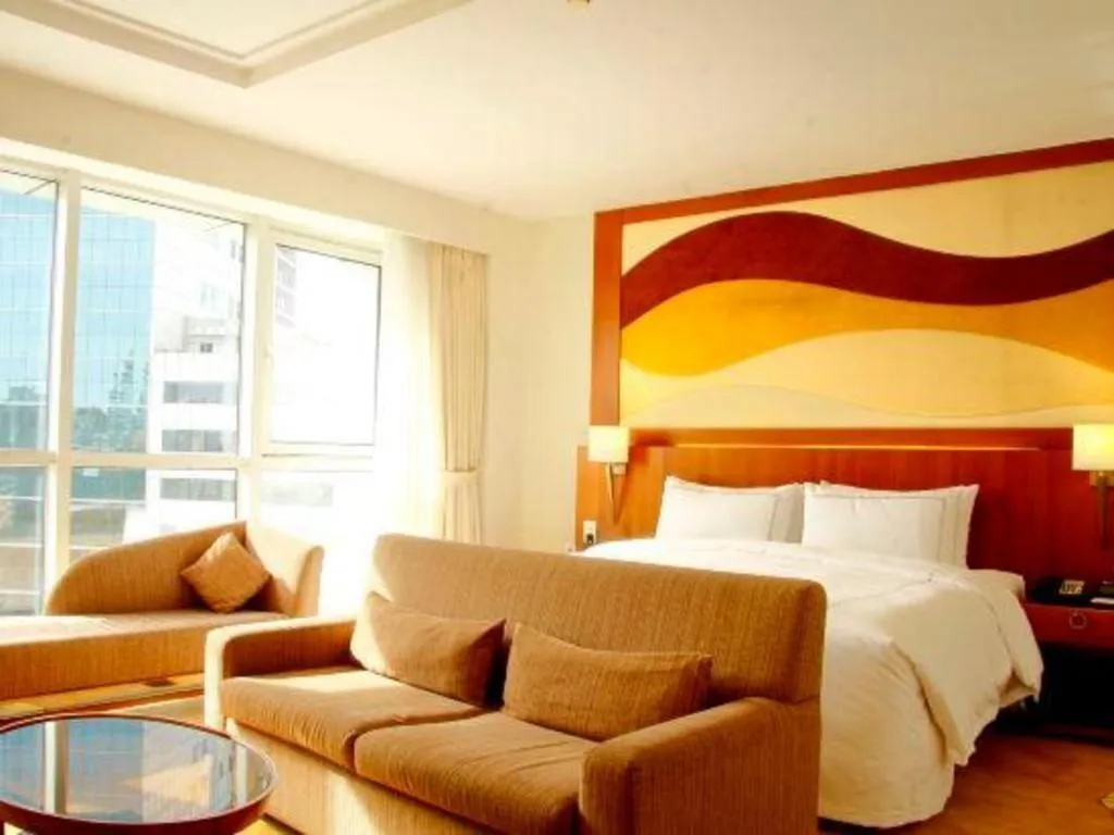 Bed in Jianguo Garden Hotel