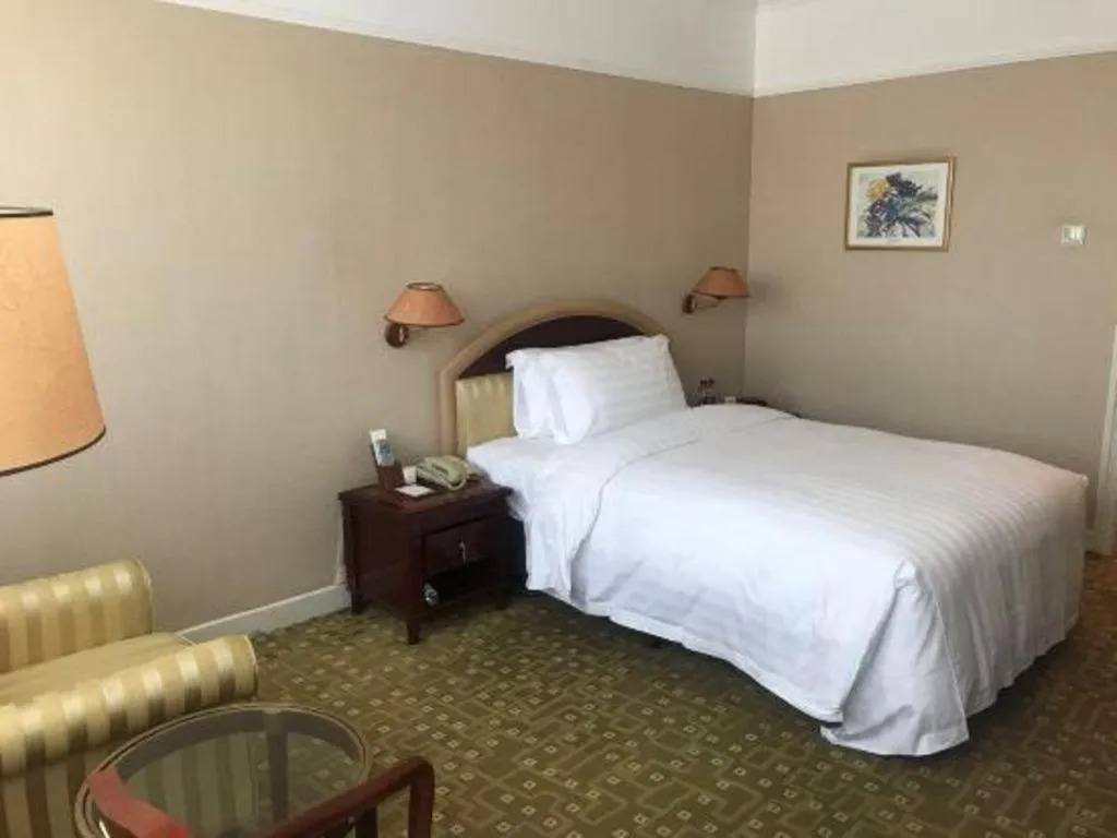 Bed in Jianguo Garden Hotel