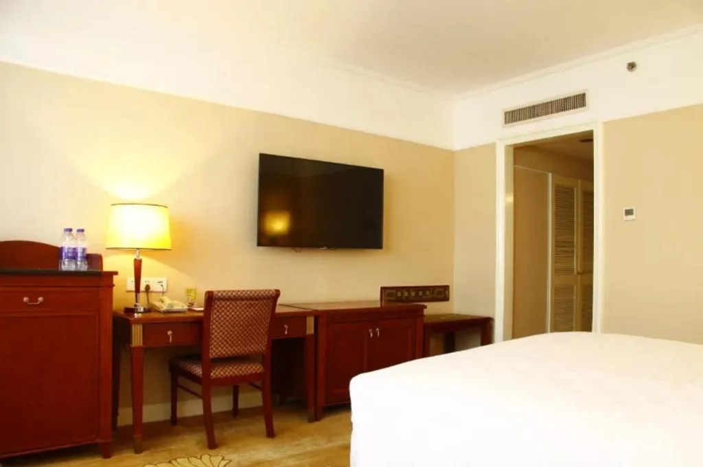 Bed in Jianguo Garden Hotel