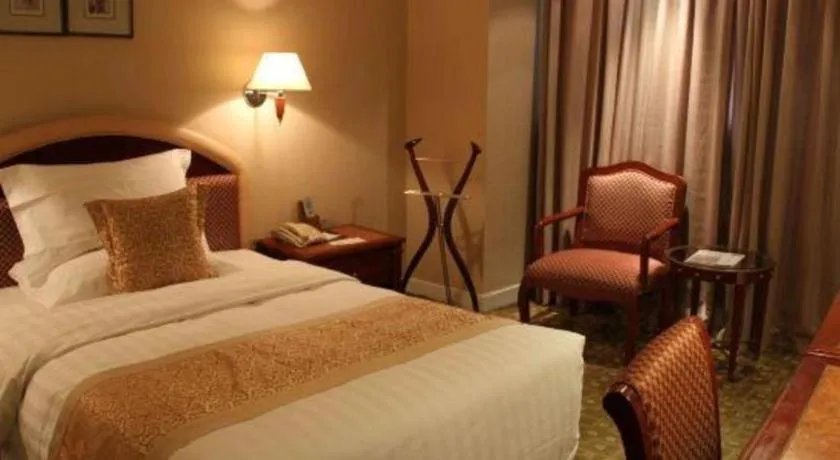 Bed in Jianguo Garden Hotel