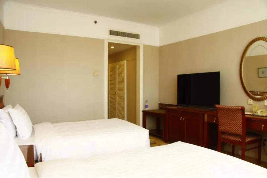 Bed in Jianguo Garden Hotel