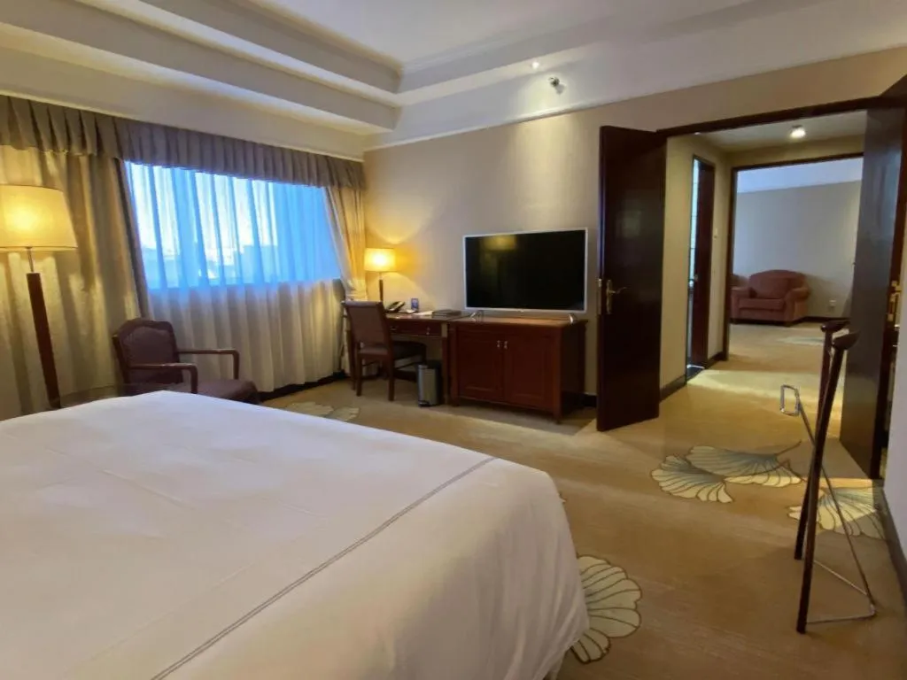 Bed in Jianguo Garden Hotel