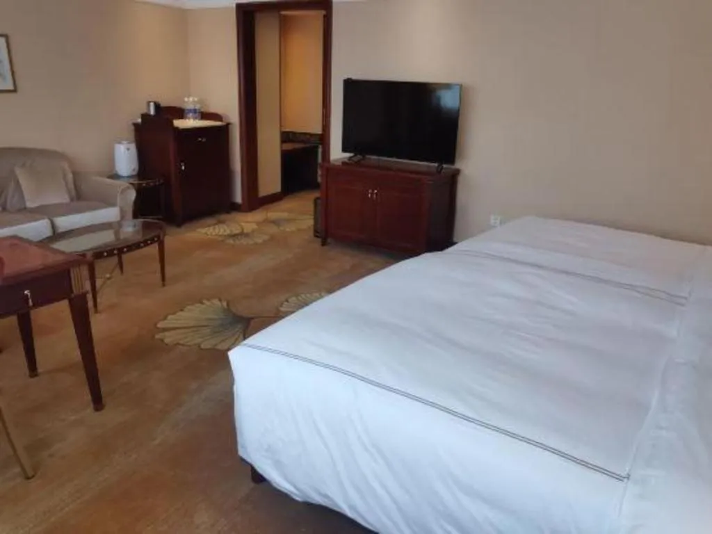 Bed in Jianguo Garden Hotel